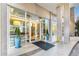 A welcoming building entrance with decorative potted plants at 3300 Windy Ridge Se Pkwy # 718, Atlanta, GA 30339