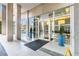 A welcoming building entrance with decorative potted plants at 3300 Windy Ridge Se Pkwy # 718, Atlanta, GA 30339