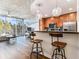 Bright open-concept living space with floor-to-ceiling windows and concrete ceilings at 3300 Windy Ridge Se Pkwy # 718, Atlanta, GA 30339