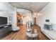 Open-concept living and kitchen area with modern finishes and plenty of natural light at 3300 Windy Ridge Se Pkwy # 718, Atlanta, GA 30339