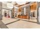Inviting lobby featuring stone accents, a reception desk, and tile flooring at 3300 Windy Ridge Se Pkwy # 718, Atlanta, GA 30339
