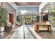 Sun-filled lobby with seating area and decorative plants at 3300 Windy Ridge Se Pkwy # 718, Atlanta, GA 30339