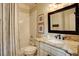 Clean bathroom featuring a tub with shower, granite countertop, and vanity at 3510 Woodbury Creek Dr, Cumming, GA 30041