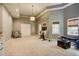 Light and bright bonus room featuring neutral walls and carpet, recessed lighting, and ample open space at 3510 Woodbury Creek Dr, Cumming, GA 30041