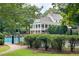 Community pool with stone detailing, featuring an outdoor covered seating area at 3510 Woodbury Creek Dr, Cumming, GA 30041