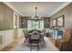 Elegant dining room with hardwood floors, chandelier, and plenty of room to entertain at 3510 Woodbury Creek Dr, Cumming, GA 30041