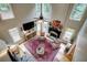 Cozy living room with high ceilings, fireplace, and large windows at 3510 Woodbury Creek Dr, Cumming, GA 30041