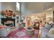 Open living room features a stone fireplace and views into the kitchen at 3510 Woodbury Creek Dr, Cumming, GA 30041