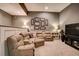 Comfortable living room with a plush sectional sofa, recessed lighting, and a large television for relaxing at 3510 Woodbury Creek Dr, Cumming, GA 30041