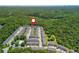 Stunning aerial view of townhome community, pool, and surrounding lush greenery at 3799 Chattahoochee Summit Se Dr # 5, Atlanta, GA 30339
