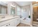 Bathroom featuring double sinks, bathtub, and a glass door shower at 3799 Chattahoochee Summit Se Dr # 5, Atlanta, GA 30339