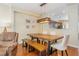 Cozy dining area featuring a rustic wooden table, comfortable seating, and a warm, inviting ambiance at 3799 Chattahoochee Summit Se Dr # 5, Atlanta, GA 30339
