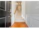 Bright foyer with hardwood floors and staircase, providing a welcoming entry into the home at 3799 Chattahoochee Summit Se Dr # 5, Atlanta, GA 30339