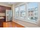 Stainless steel refrigerator and a window seat in a kitchen, with natural light at 3799 Chattahoochee Summit Se Dr # 5, Atlanta, GA 30339