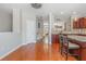 Open-concept kitchen featuring a center island with bar stools and access to the entry way at 3799 Chattahoochee Summit Se Dr # 5, Atlanta, GA 30339