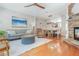 Inviting living room with hardwood floors, a stone fireplace, stylish furnishings, and an open layout at 3799 Chattahoochee Summit Se Dr # 5, Atlanta, GA 30339