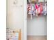 Well-organized walk-in closet with hanging clothes, shelves, and storage for easy access and visibility at 3799 Chattahoochee Summit Se Dr # 5, Atlanta, GA 30339