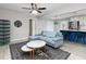 Open-concept living room with modern furnishings and a seamless flow to the kitchen at 551 Floyd Se Dr, Smyrna, GA 30082