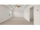 Spacious bedroom with a ceiling fan and walk-in closet at 1591 Oakbrook Pond Place, Dacula, GA 30019