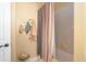 This bathroom offers a shower over tub with tiled wall and towels hanging on the wall at 1967 Mason Mill Rd, Decatur, GA 30033