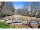 Enjoy this common green space with benches, perfect for relaxing and socializing at 1967 Mason Mill Rd, Decatur, GA 30033