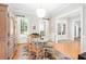 Light-filled dining room with French doors, hardwood floors, and traditional furnishings at 1967 Mason Mill Rd, Decatur, GA 30033
