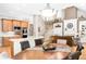 Open concept dining area with island, staircase, and fireplace at 1967 Mason Mill Rd, Decatur, GA 30033