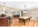 Entertaining game room with a pool table, a bar area, and ample space for recreation at 1967 Mason Mill Rd, Decatur, GA 30033