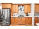 Modern kitchen with stainless steel appliances, wooden cabinets, and sleek countertops at 1967 Mason Mill Rd, Decatur, GA 30033