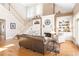 Elegant living room featuring a fireplace, built-in shelves, and hardwood floors at 1967 Mason Mill Rd, Decatur, GA 30033