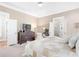 Comfortable main bedroom featuring a dresser and ensuite bathroom at 1967 Mason Mill Rd, Decatur, GA 30033