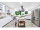 Bright and airy kitchen with stainless steel appliances, a center island, and stylish built-in storage at 41 Basswood Cir, Sandy Springs, GA 30328