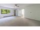 Bright main bedroom with a neutral color palette, natural light, and private ensuite bathroom at 41 Basswood Cir, Sandy Springs, GA 30328