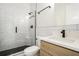 Modern bathroom with glass shower and white subway tile at 4276 Lindsey Ne Way, Roswell, GA 30075