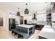 Modern kitchen with stainless appliances, white cabinets, and a center island with seating at 4276 Lindsey Ne Way, Roswell, GA 30075