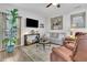 Cozy living room with stylish decor, comfortable seating, and natural light at 779 Sanders Rd, Cumming, GA 30041