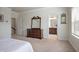 Bedroom with warm carpet, a large dresser, and lots of natural light at 1188 Parktown Dr, Mableton, GA 30126