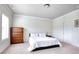 Bedroom with neutral carpet, large window and a dresser at 1188 Parktown Dr, Mableton, GA 30126