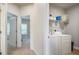 Laundry room featuring storage shelf and appliances at 1188 Parktown Dr, Mableton, GA 30126
