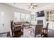 Bright living room featuring a fireplace, built-in shelving, and hardwood floors at 1188 Parktown Dr, Mableton, GA 30126