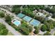 Aerial view showcases community amenities, a pool and tennis courts, for an active lifestyle at 1274 Ridge Vista Ct, Lawrenceville, GA 30043