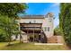 Spacious backyard with a large deck, perfect for outdoor entertaining and relaxation at 1274 Ridge Vista Ct, Lawrenceville, GA 30043