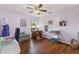 Versatile bonus room with hardwood floors, ceiling fan, perfect for use as a craft room or office at 1274 Ridge Vista Ct, Lawrenceville, GA 30043