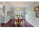 Traditional dining room with hardwood floors, chandelier, and classic decor at 1274 Ridge Vista Ct, Lawrenceville, GA 30043