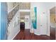Elegant foyer with hardwood floors, staircase with iron railings, and stylish decor at 1274 Ridge Vista Ct, Lawrenceville, GA 30043