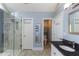 Spacious main bathroom with a glass-enclosed shower and granite countertops at 1274 Ridge Vista Ct, Lawrenceville, GA 30043