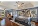 Large main bedroom featuring a tray ceiling, sitting area, and ample natural light at 1274 Ridge Vista Ct, Lawrenceville, GA 30043