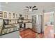 Well-equipped kitchen with stainless steel appliances and granite countertops is perfect for cooking and entertaining at 2005 Sweetgum Trl, Cumming, GA 30041