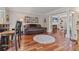 Spacious living room with hardwood floors, fireplace, and open layout at 2005 Sweetgum Trl, Cumming, GA 30041
