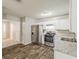 Bright kitchen with stainless steel appliances at 5786 Longbow Dr, Stone Mountain, GA 30087